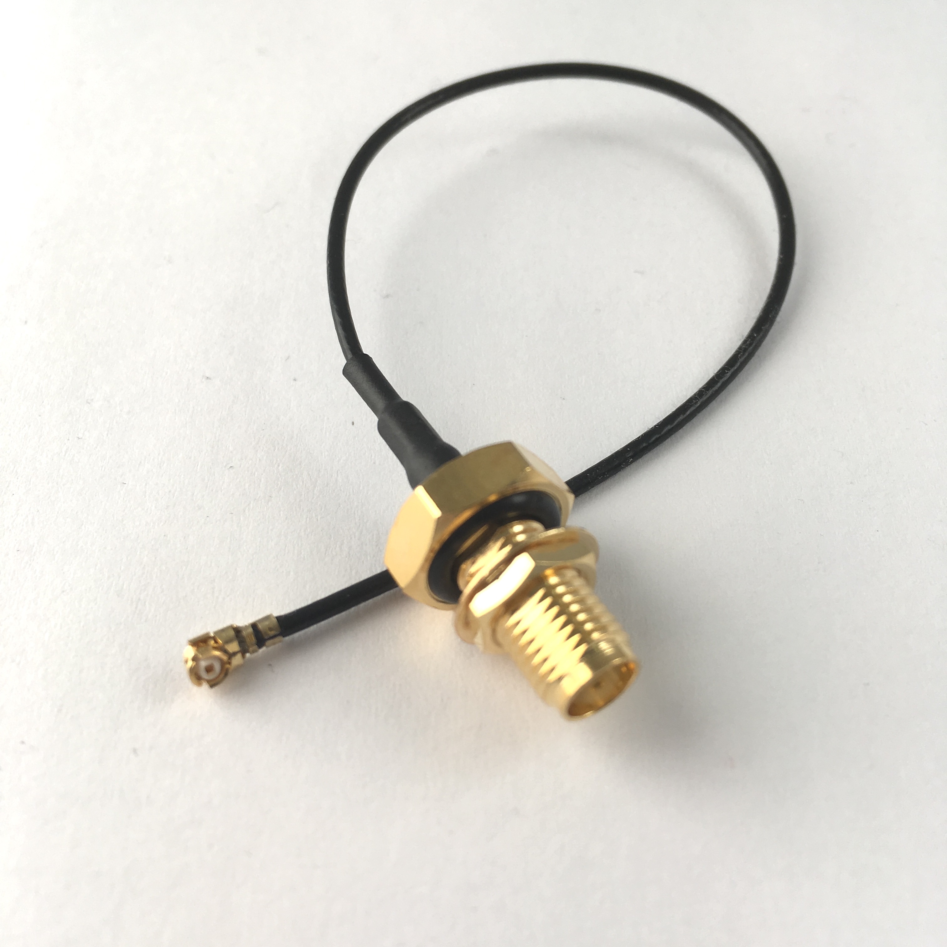 UFL Right Angle Plug - SMA Female Bulkhead (C137UFL015SMABJ) | From Co-Star
